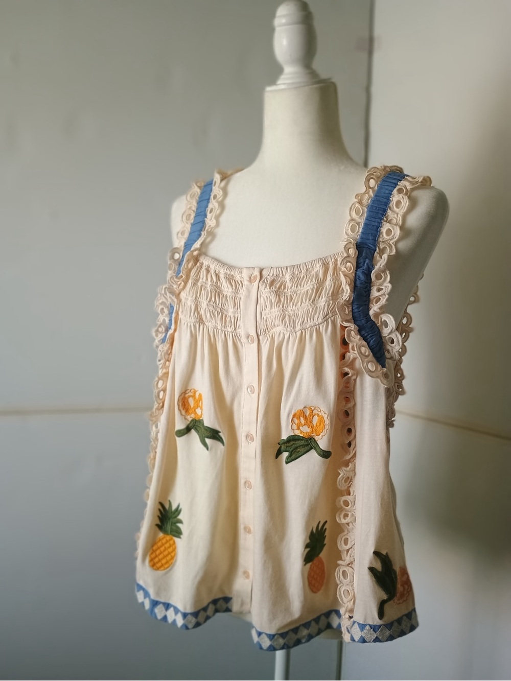 Anthropologie Cream Tank Top with Blue Trim and Pineapple Embroidery